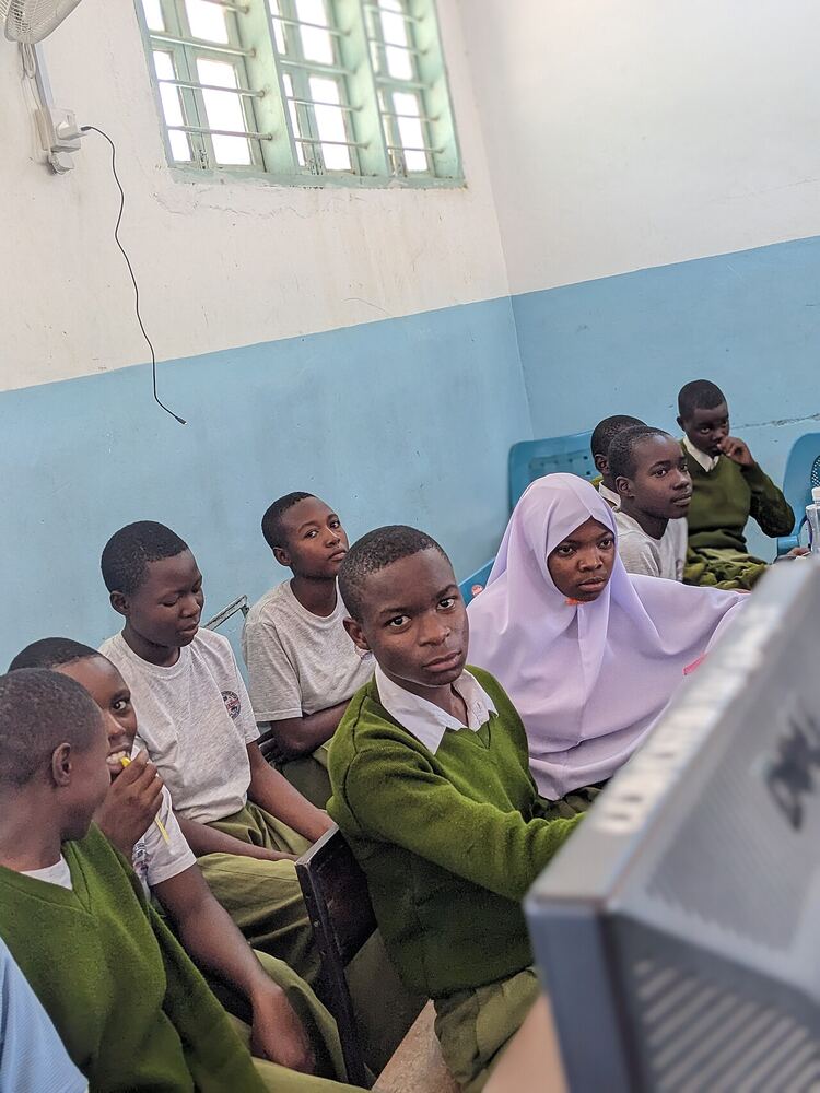 Secondary school students learning in a computer lab